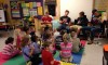 PHS Football Players Read to Meadowbrook Students